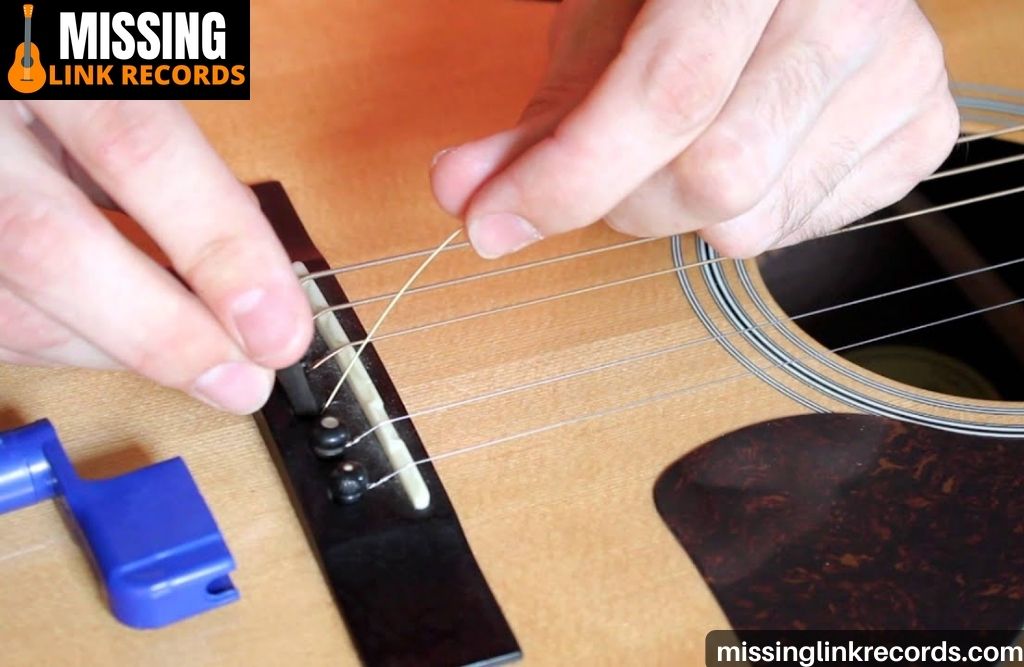 How To Change Guitar Strings Acoustic Without Tools